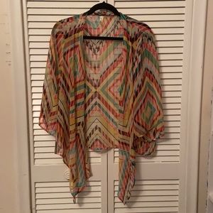 Pink black cream and green top